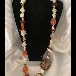 Cream necklace with bits of earthy